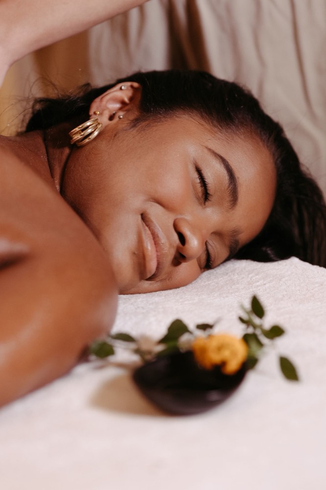 A woman relaxing during a spa treatment